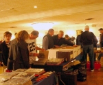 crowd looking at merchandise